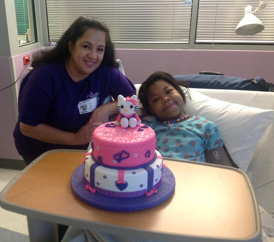 icing smiles cake at hospital